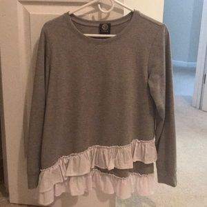 Gray sweater with white ruffles